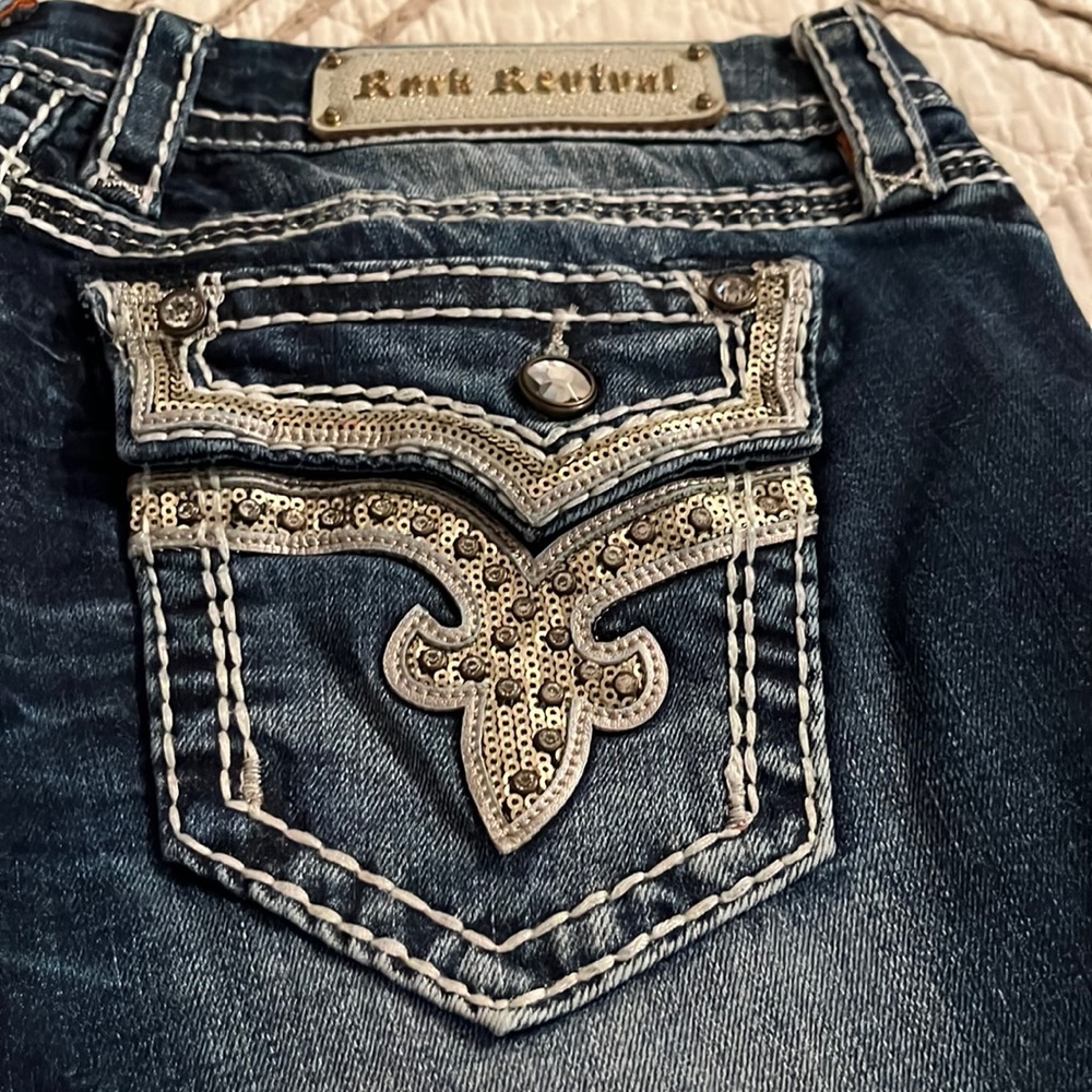 Rock Revival jeans. No missing buttons sequins or stones.